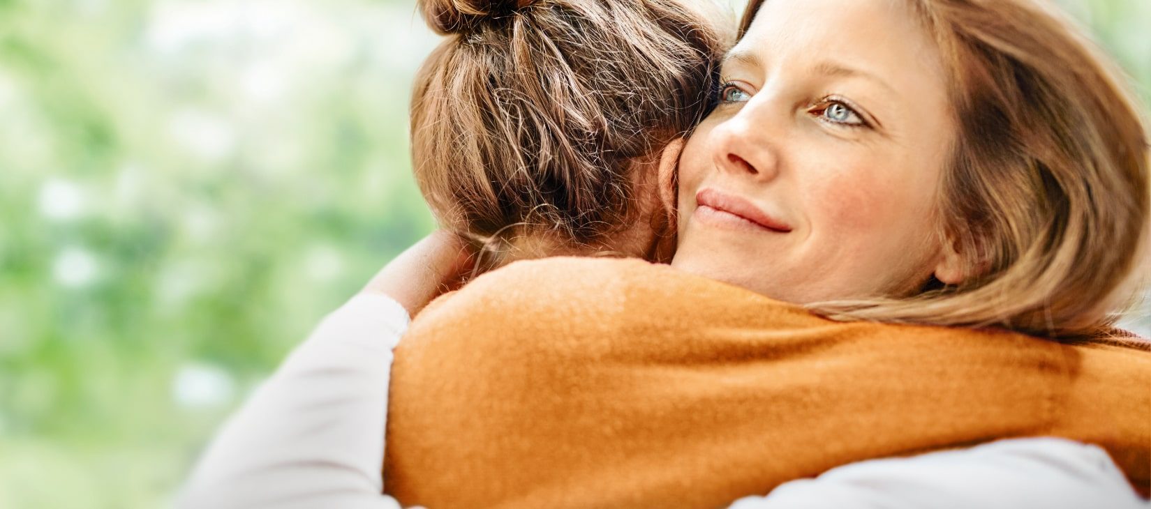 Helixor Dr. Hauschka Logo mit gelben Blüten